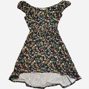 black multicolored floral dress with button accents and high-low hem
